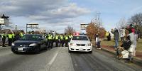  Protestors chanting slogans at police force  against police brutality on MLK Day, January 20, in Baltimore 